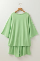 Meadow Mist Green Plus Size V Neck Drop Shoulder Tee Loose Shorts 2pcs Outfit