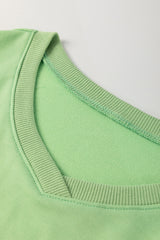 Meadow Mist Green Plus Size V Neck Drop Shoulder Tee Loose Shorts 2pcs Outfit